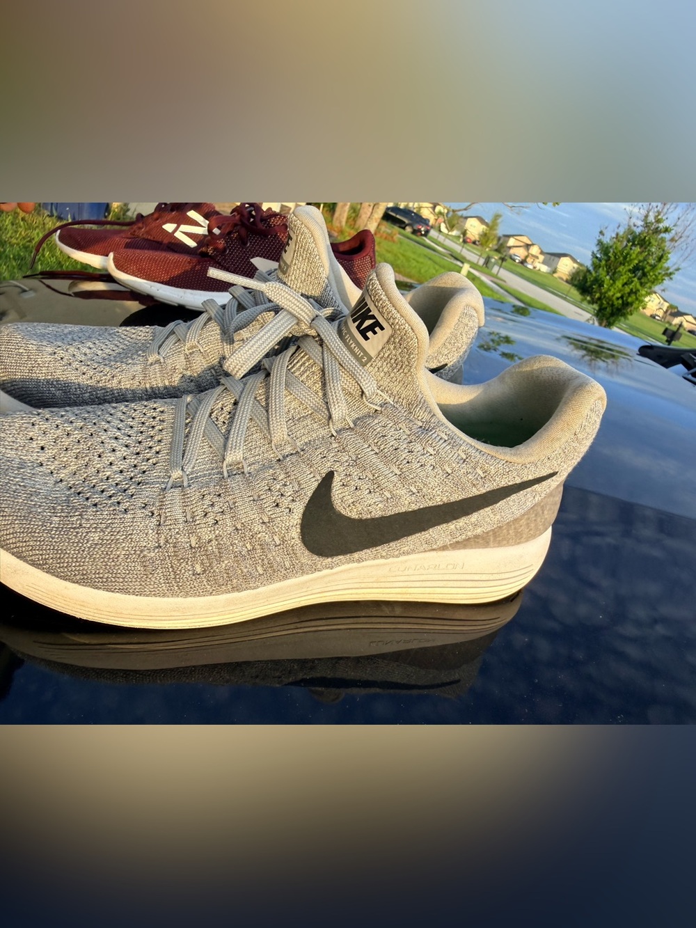 Nike Light Gray Knit Running Shoes with Black Swoosh